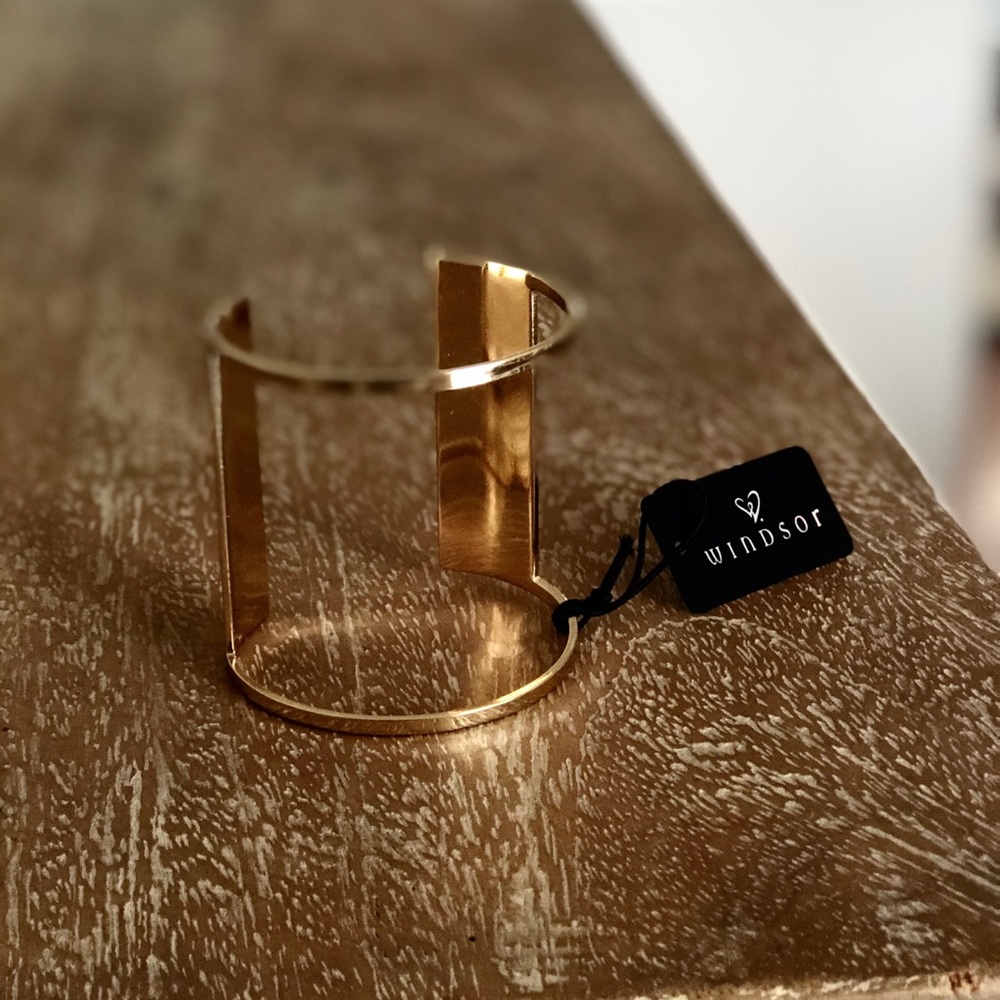 A Gold Adjustable Ringed Gladiator Bracelet